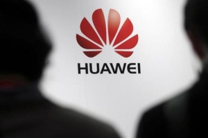 Journalists attend the presentation of the Huawei's new smartphone, the Ascend P7, launched by China's Huawei Technologies in Paris